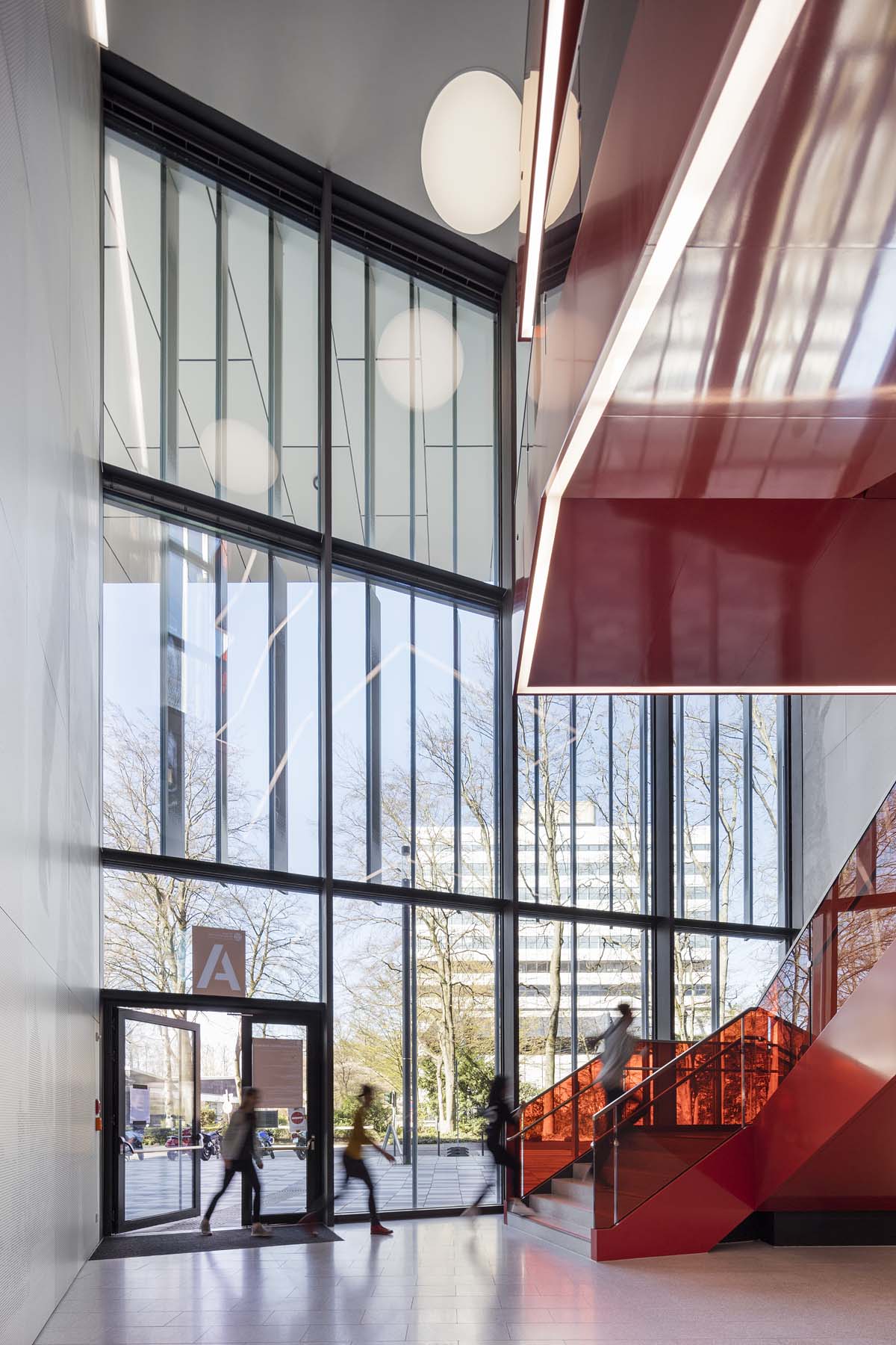 Sporthochschule Köln kadawittfeldarchitektur  Treppenhaus Foyer Architekturfotografie Jens Kirchner